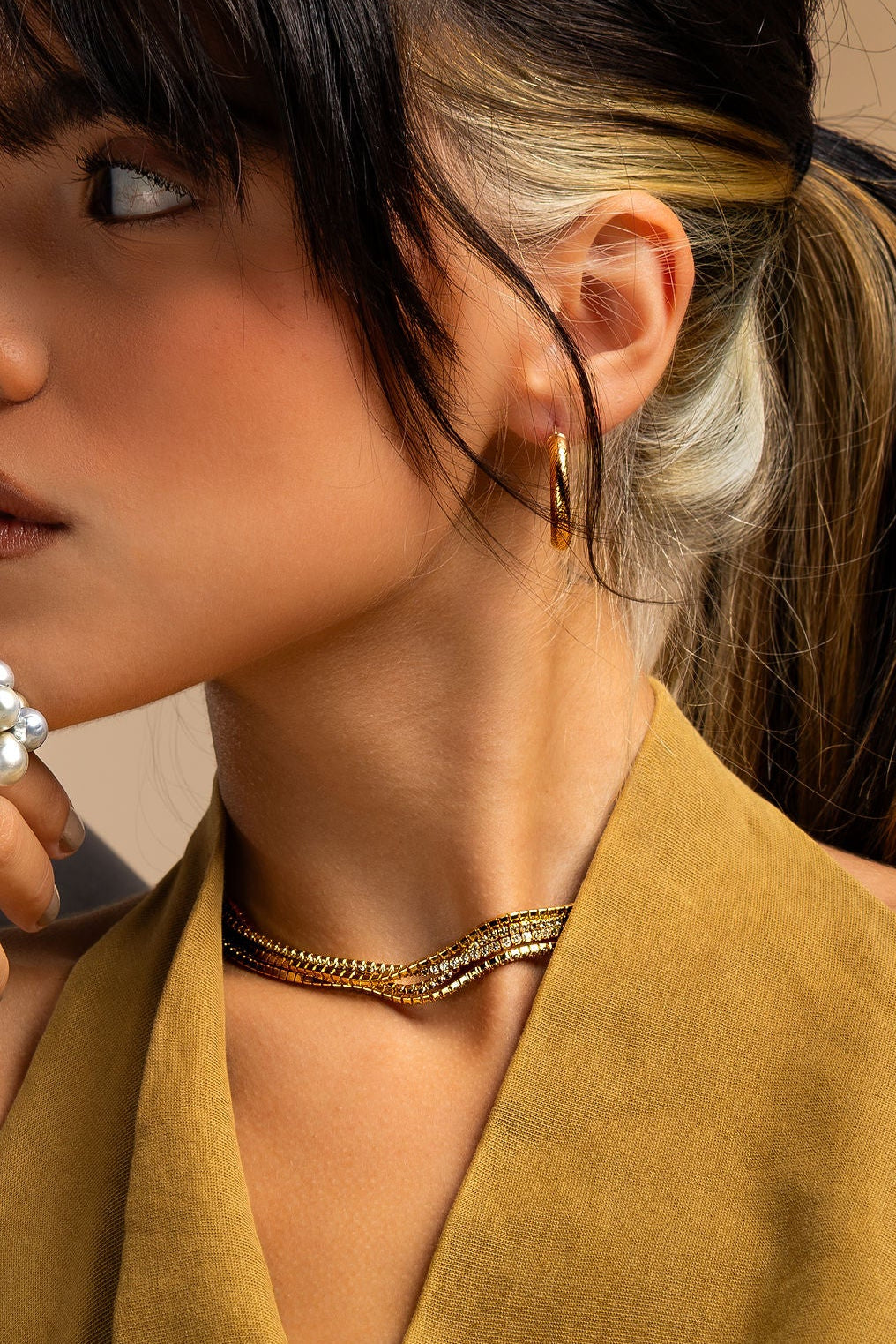 Arracadas texturizadas en oro amarillo 14K