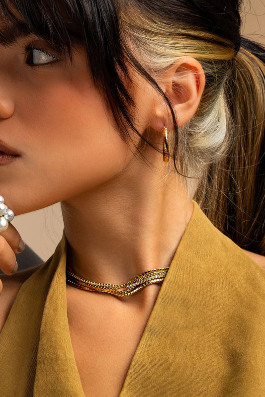 Arracadas texturizadas en oro amarillo 14K