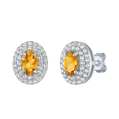 Aretes tipo stud con piedra natural y halo de zafiros blancos de laboratorio