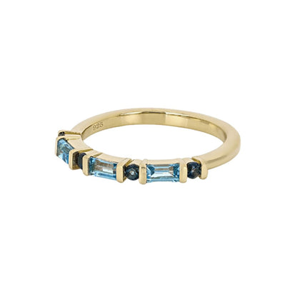 Anillo Churumbela Topacio Suizo 0.43ctw y Topacio London Blue en Plata con Baño de Oro 18k