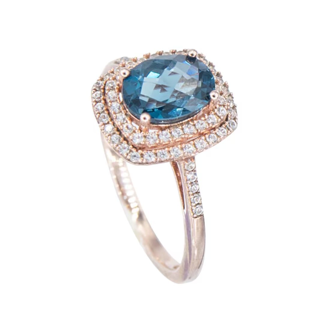 Anillo Topacio London Blue y Zafiro Blanco de Laboratorio en Plata con baño de oro Rosado