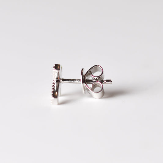Aretes de cruz con diamantes naturales en plata